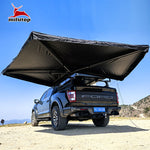 Toldo lateral negro Mistral 270cm desplegado en Ford Raptor – toldo para coche 270 grados Overvian